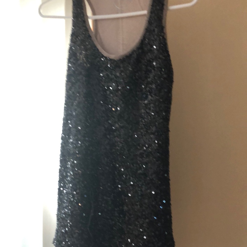 Beige and black sparkly sleeves top